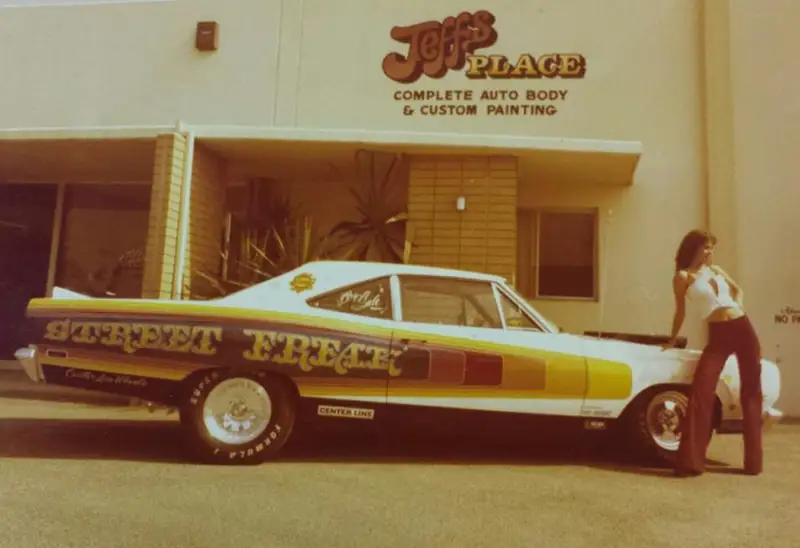 Photo of a model with Street Freak drag car in front of Jeff's Place
