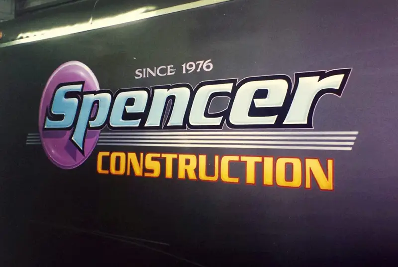 Spencer Construction logo painted on vehicle