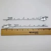 Pinhead Emblems with ruler showing length